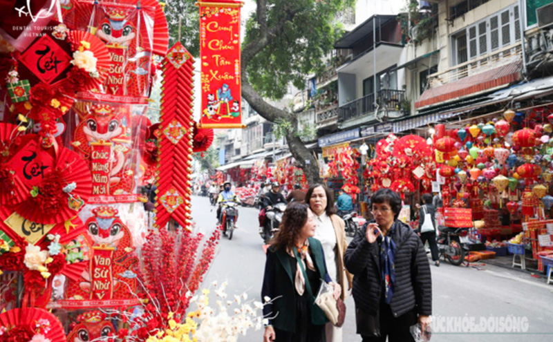 Foreign Tourists Experiencing Vietnamese Tet